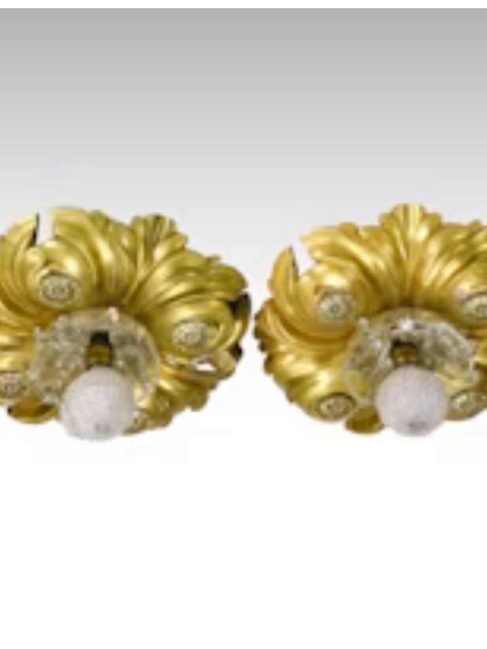 Pair of Hollywood Regency Style Gilt metal and Crystal lights.